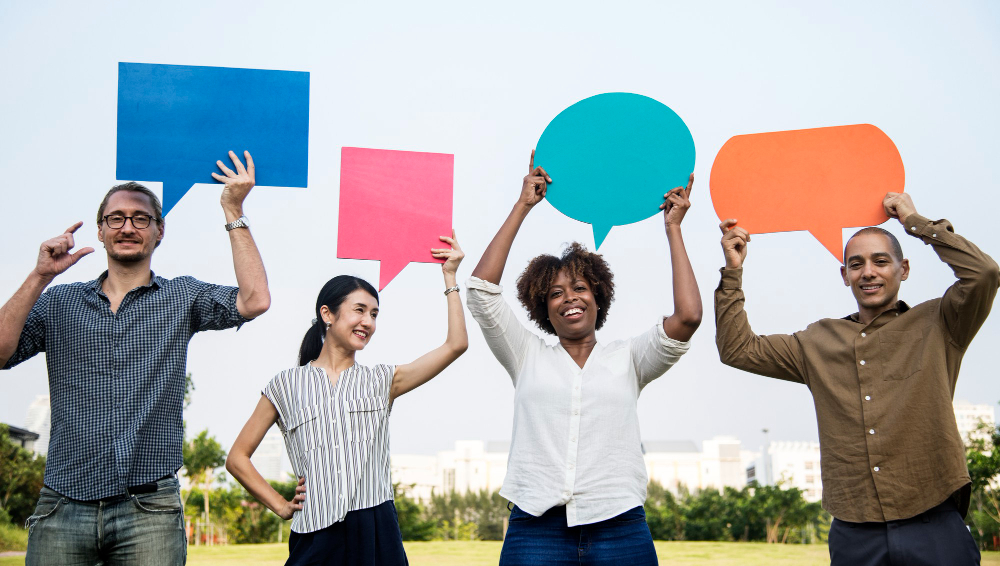 Diverse Friends Holding Speech Bubbles