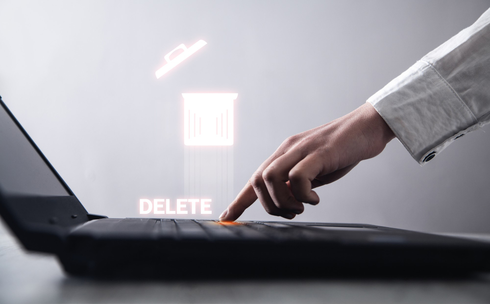 Hand Typing Laptop Keyboard Delete