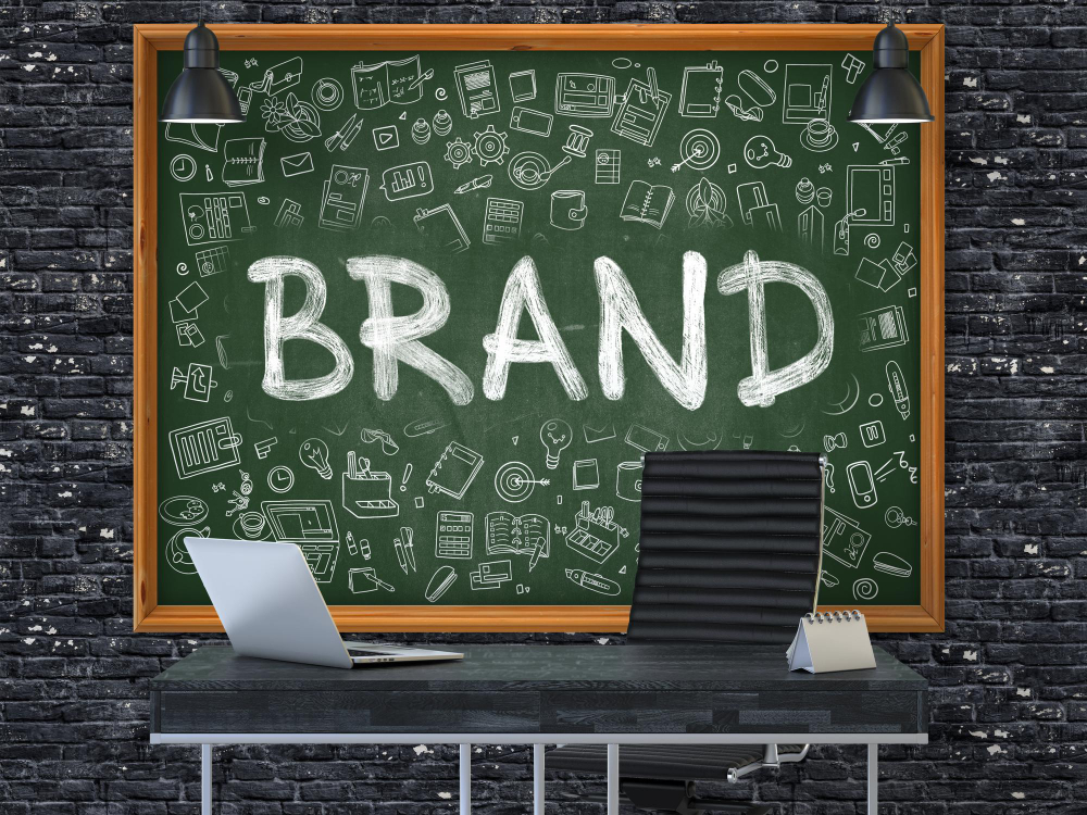 Hand Drawn Brand on Green Chalkboard 