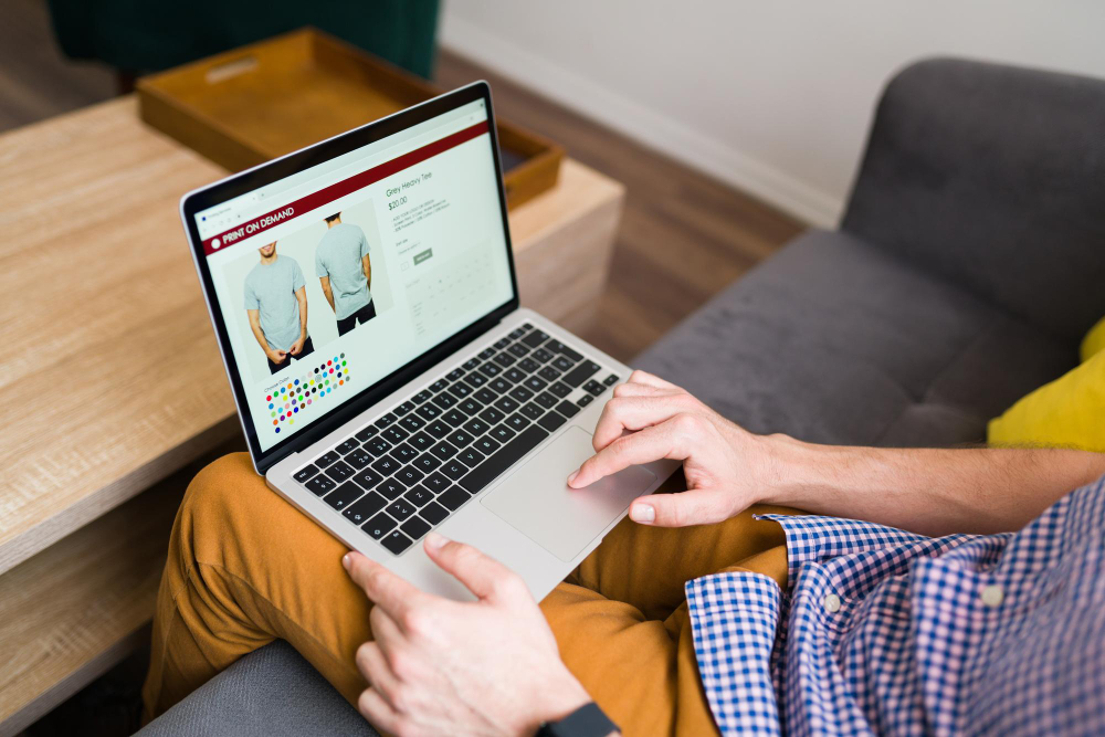 Young Man Buying Clothes Online