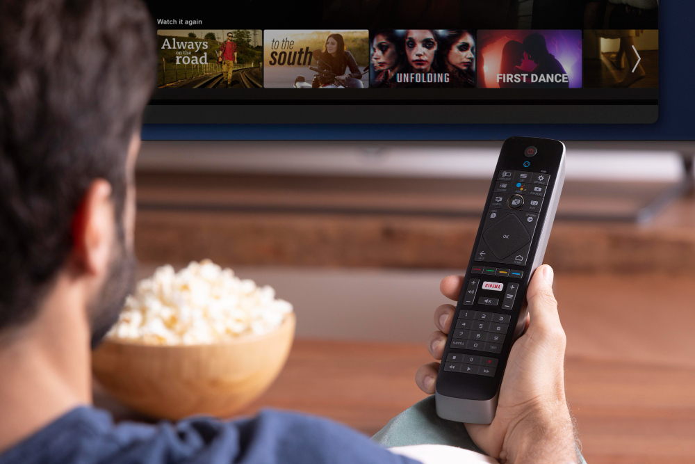 Man Watching a Show on His TV